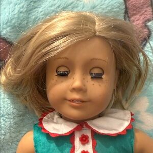 American Girl Doll with Blonde Hair and Blue Eyes